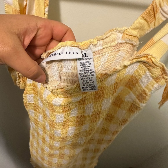 Yellow plaid drop-waist dress with smocking throughout. Tie bows on shoulders. - Picture 2 of 2